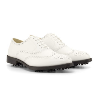 The Brogue Golf Shoe: White. White Box calf leather golf shoes with toe embellishments on a white background